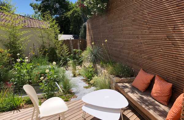 Créer une oasis de verdure dans un lotissement avec un jardin de 200m² à Lyon