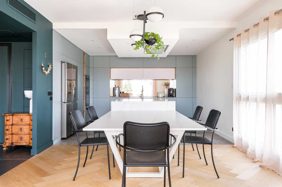 Salle à manger d'un appartement VEFA aménagé par un architecte