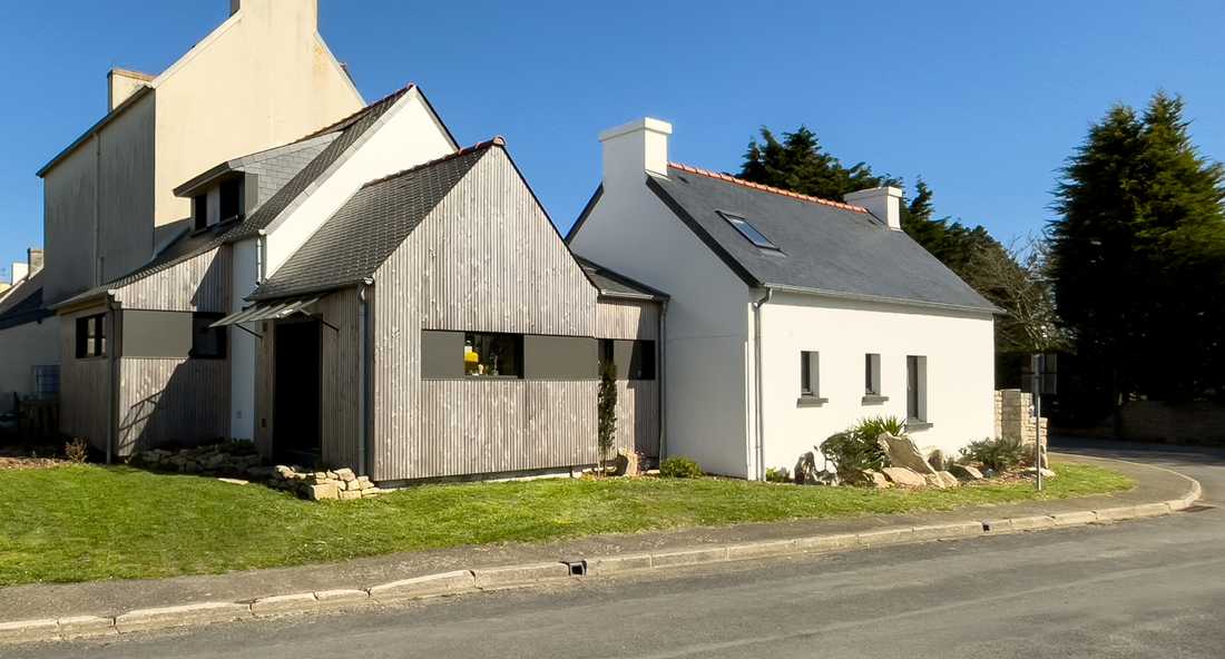 Extension of a set of three stone buildings